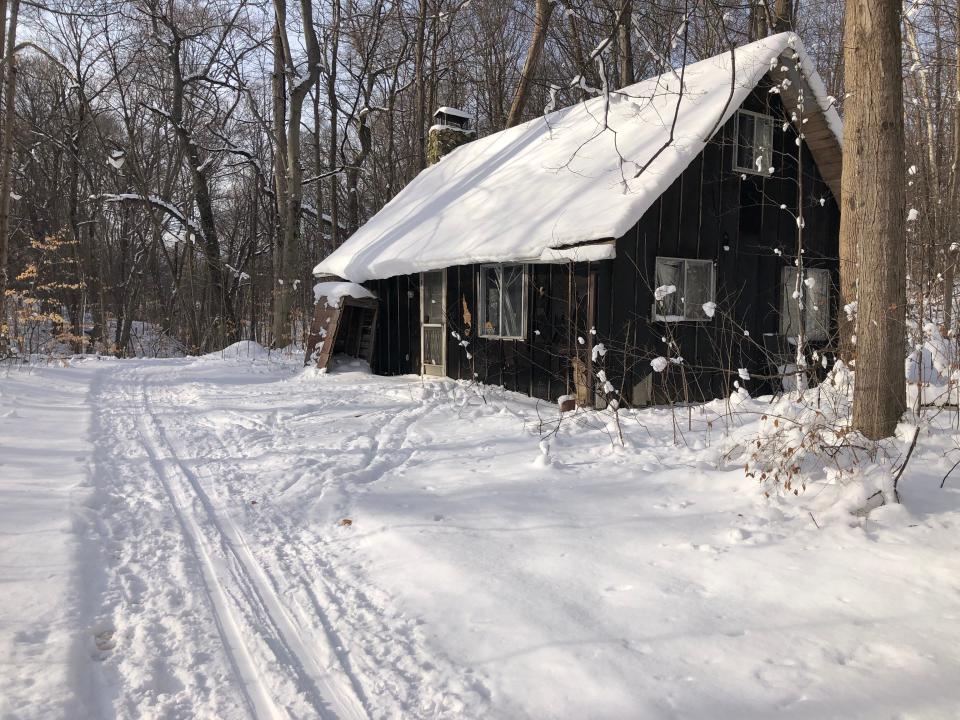 The ski trail at Love Creek County Park in Berrien Center cruises by a vacant cabin that the park plans to turn into a picnic shelter, as seen on Dec. 27, 2022.