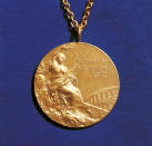 <p>A gold medal from the 1972 Munich Olympics. (Mario De Biasi/Mondadori Portfolio via Getty Images) </p>