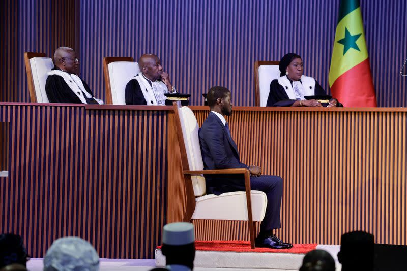 Senegal's Newly elected president Bassirou Diomaye Faye takes the oath of office as president during the inauguration ceremony in Dakar