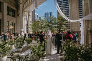 40 couples will have the chance to celebrate their micro weddings or civil unions performed by volunteer Circuit Court of Cook County Judges at The Wrigley Building on The Magnificent Mile this fall, October 1, 2022. Photo by Jamie &amp; Eric Photography of the 2021 Weddings at Wrigley event.