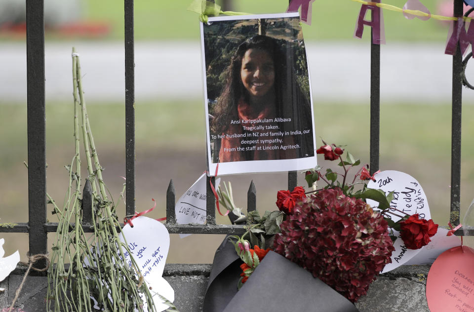 A tribute of a victim of mosque shooting, Ansi Alibava, hangs on a wall at the Botanical Gardens in Christchurch, New Zealand, Thursday, March 21, 2019. Thousands of people were expected to come together for an emotional Friday prayer service led by the imam of one of the two New Zealand mosques where 50 worshippers were killed in a white supremacist attack on Friday March 15. (AP Photo/Mark Baker)