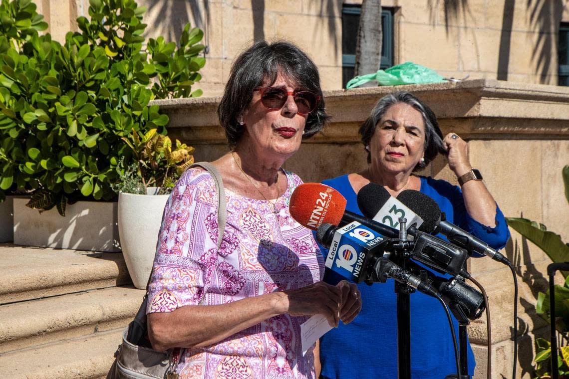 Alicia Pelaez listens as Elena Muñoz speaks during a press conference held by former Cuban unaccompanied minors known as Pedro Pans and Democratic candidates at the Freedom Tower in Miami on Wednesday, Sept. 7, 2022.