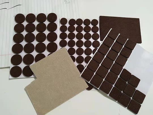 A pack of 133 felt furniture pads