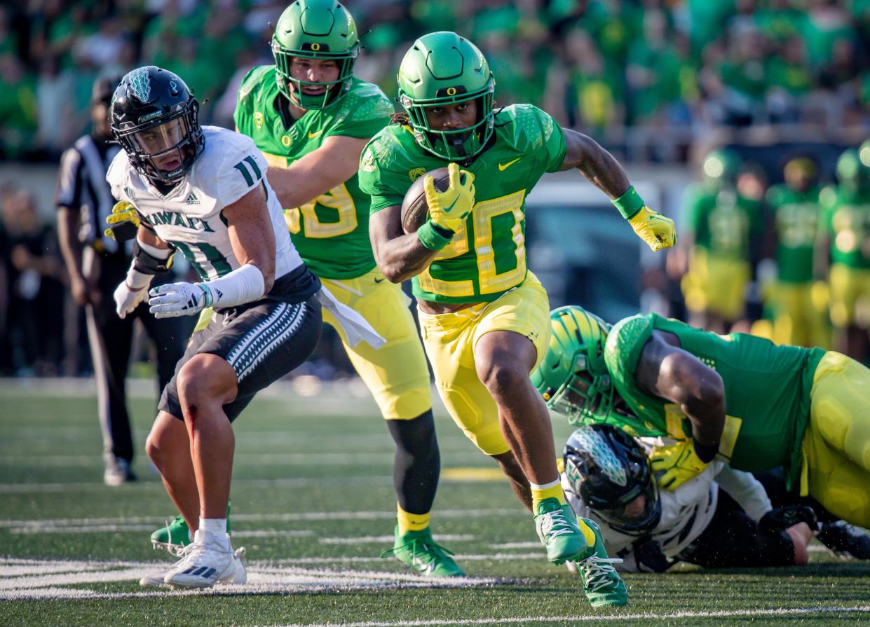 Oregon running back Jordan James carries the ball as the Oregon Ducks host Hawaii Sept. 16.