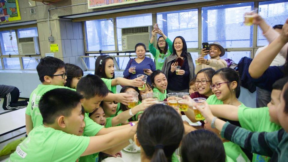 The PS 124 theater club celebrates a successful run at the Junior Theater Festival.