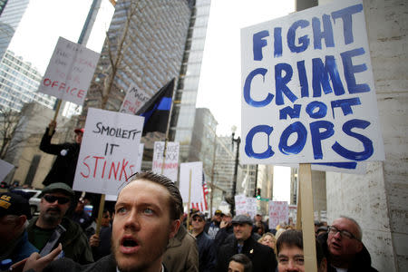 Fraternal Order of Police supporters protest the handling of the Jussie Smollett case by the State's Attorney Kim Foxx in Chicago, Illinois, U.S., April 1, 2019. REUTERS/Joshua Lott