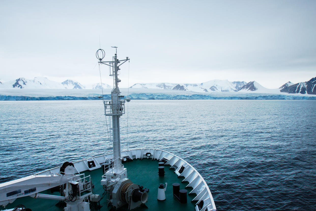 The bow of a ship sailing through Antarctica waters.