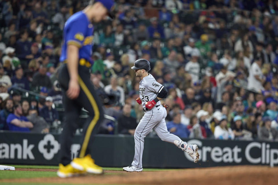 Chicago White Sox's Andrew Benintendi runs the bases on a solo home run off Seattle Mariners starting pitcher Bryan Woo during the sixth inning of a baseball game Friday, June 16, 2023, in Seattle. (AP Photo/John Froschauer)