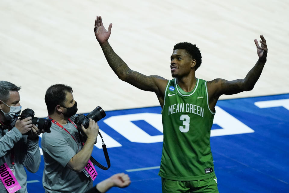 North Texas's Javion Hamlet celebrates after North Texas defeated Purdue, 78-69, in overtime of a first-round game in the NCAA men's college basketball tournament at Lucas Oil Stadium, Friday, March 19, 2021, in Indianapolis. (AP Photo/Darron Cummings)