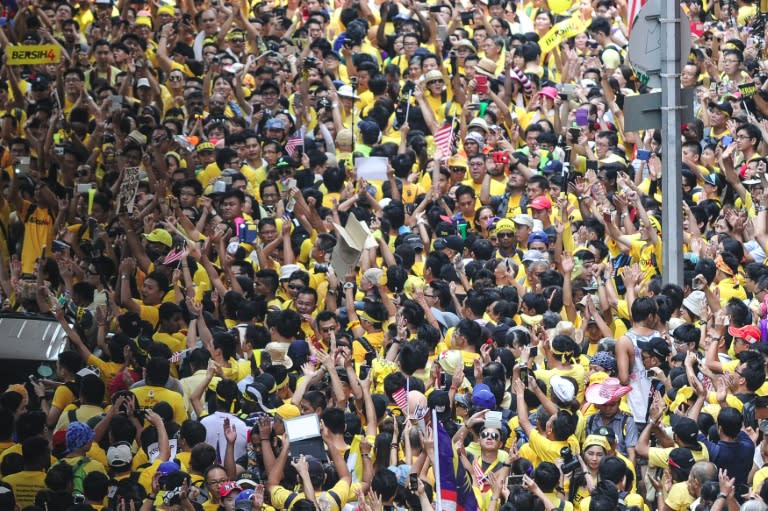 Protestors gather on a street on the second day of a demonstration demanding Prime Minister Najib Razak’s resignation and electoral reforms in Kuala Lumpur on August 30, 2015