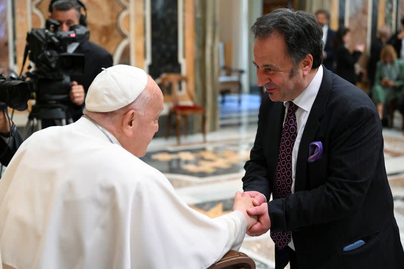 Pope Francis meets with comedians during a cultural event at the Vatican