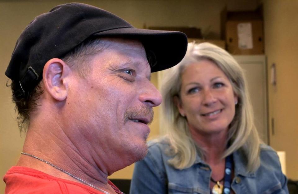 As program case manager Nicole Smith listens during a Aug. 4, 2023 interview participant Donald Collins describes his personal challenges and how the LEAD program had assisted his recovery.The Law Enforcement Assisted Diversion (LEAD) arrest diversion program is a collaborative community safety effort that offers law enforcement a credible alternative to booking people into jail for criminal activity that stems from unmet behavioral health needs or poverty.