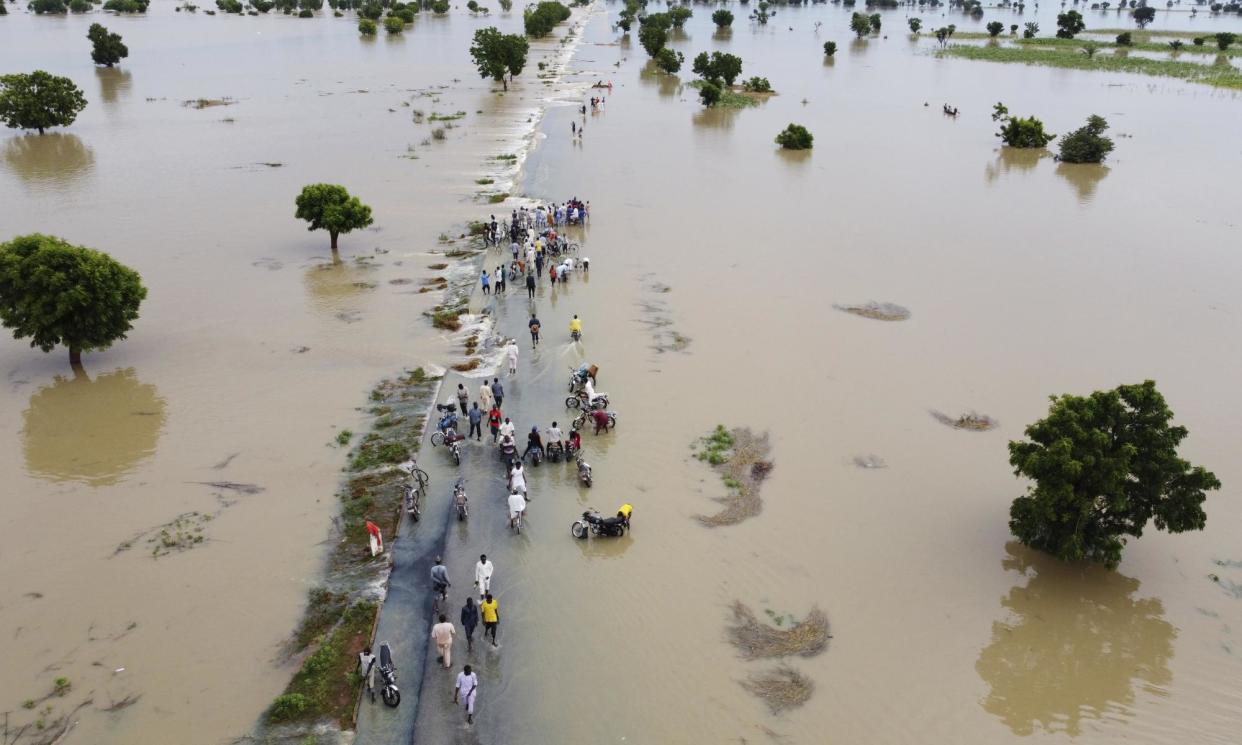 <span>Flooding in Hadeja, Nigeria, in 2022. As with the latest warning the floods were caused by heavy rainfall and the release of water from the Lagdo dam in Cameroon.</span><span>Photograph: AP Photo/AP</span>