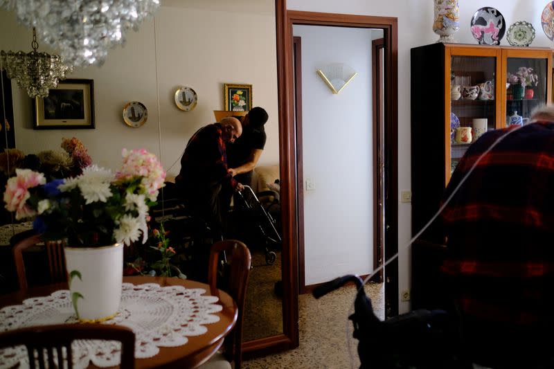 The Wider Image: High power prices drive some patients in Spain into poverty