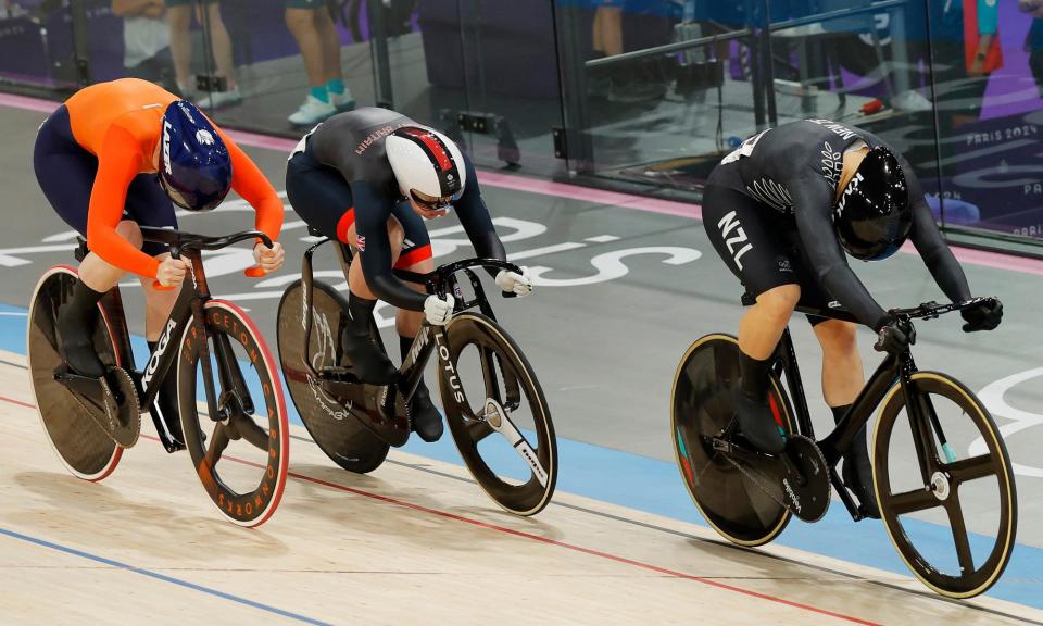 <span>Ellesse Andrews, of New Zealand, leads the way on the way to gold from Team GB’s Emma Finucane (centre) and Hetty van de Wouw, of the Netherlands (left), in the keirin.</span><span>Photograph: Tom Jenkins/The Guardian</span>