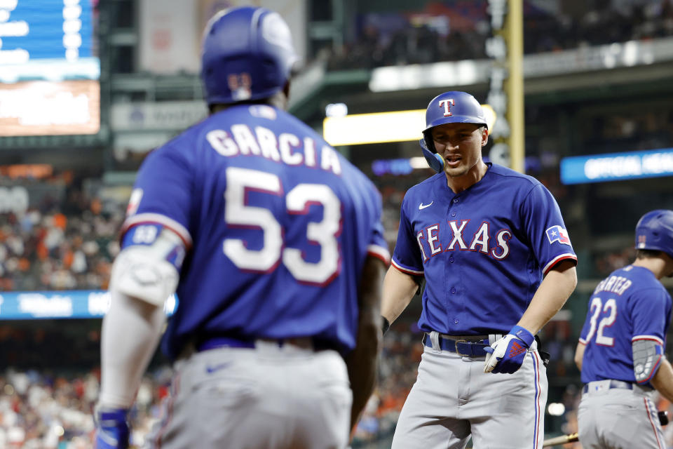 Corey Seager and Adolis García have powered Texas all month. (Carmen Mandato/Getty Images)