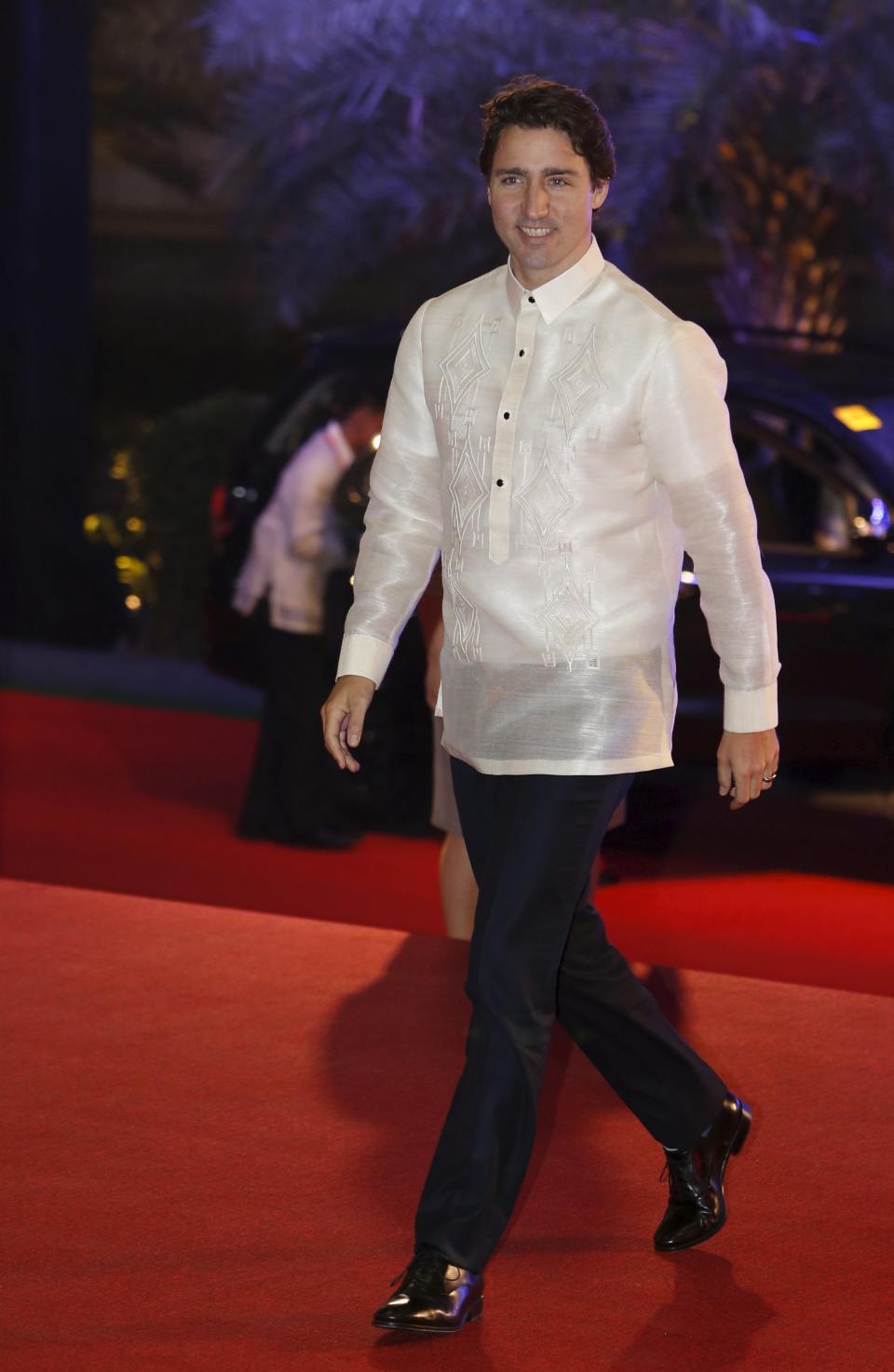 Canada's Prime Minister Justin Trudeau arrives in a traditional barong for a welcome dinner during the Asia-Pacific Economic Cooperation (APEC) summit in the capital city of Manila