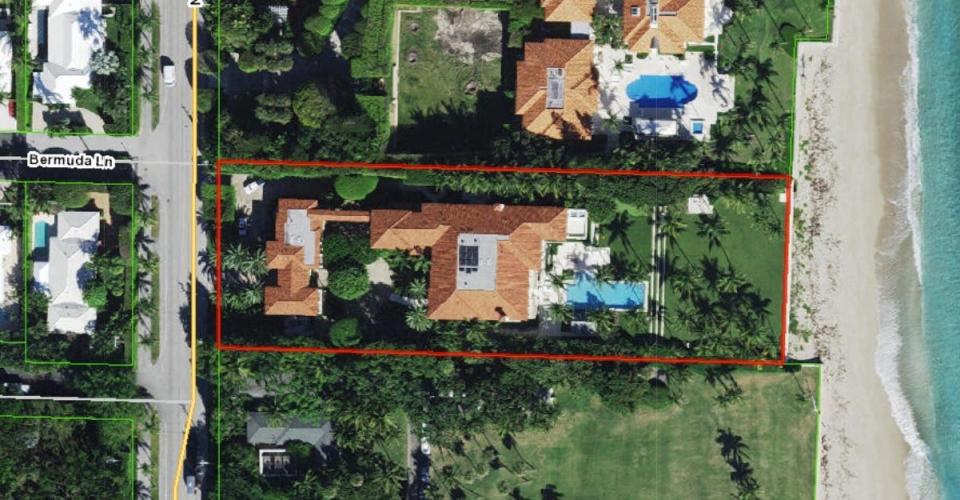 A aerial photo shows the Palm Beach oceanfront estate at 589 N. County Road outlined in red.