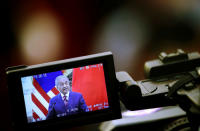 Malaysia's Prime Minister Mahathir Mohamad is seen on the screen of a camera as he holds a news conference with China's Premier Li Keqiang at the Great Hall of the People in Beijing, China, August, 20, 2018. How Hwee Young/Pool via REUTERS