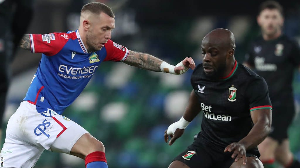 Linfield's Kirk Millar in action against Fuad Sule of Glentoran