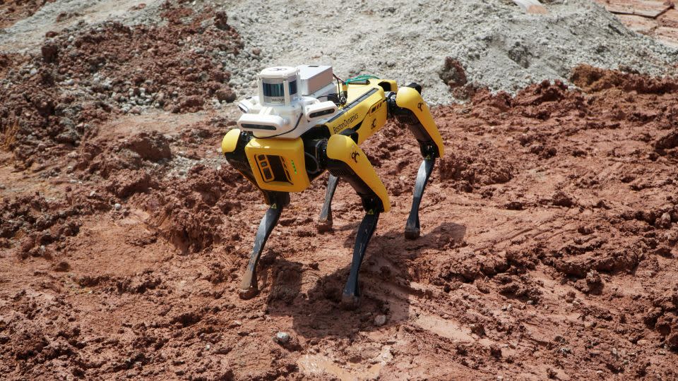 A robot made by Hyundai-owned Boston Dynamics is used to scan a construction site in Singapore for supervisors to check work progress. - Travis Teo/Reuters