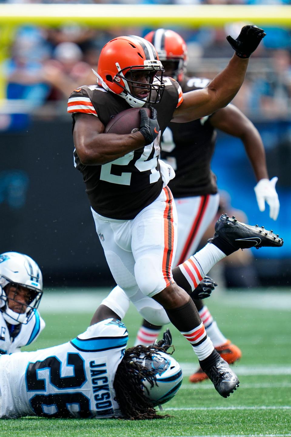 Browns running back Nick Chubb is tackled by Panthers cornerback Keith Taylor Jr. during the first quarter Sunday, Sept. 11, 2022, in Charlotte, N.C.