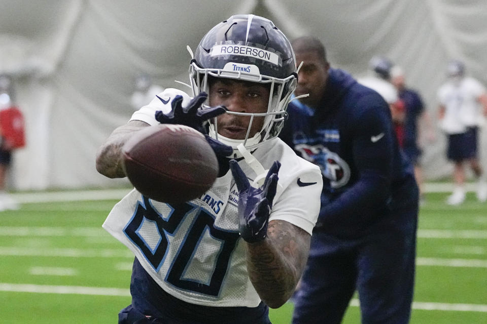Tennessee Titans wide receiver Reggie Roberson Jr. (80) pulls in a catch during the NFL football team's rookie minicamp, Saturday, May 13, 2023, in Nashville, Tenn. (AP Photo/George Walker IV)