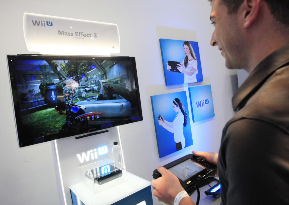 Nintendo's Wii U GamePad and console are unveiled, Thursday, Sept. 13, 2012 in New York. The gaming console will start at $300 and go on sale in the U.S. on Nov. 18, in time for the holidays, the company said Thursday. (AP Photo/Mark Lennihan)