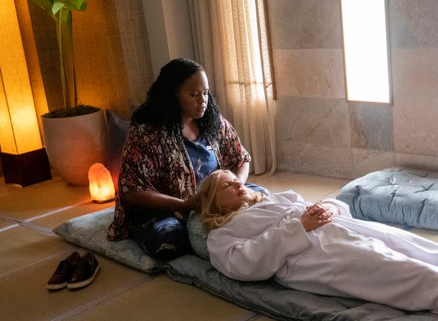 Spa manager Belinda (Natasha Rothwell) gives Tanya (Jennifer Coolidge) a massage on the HBO limited series. (Photo: Mario Perez/HBO)