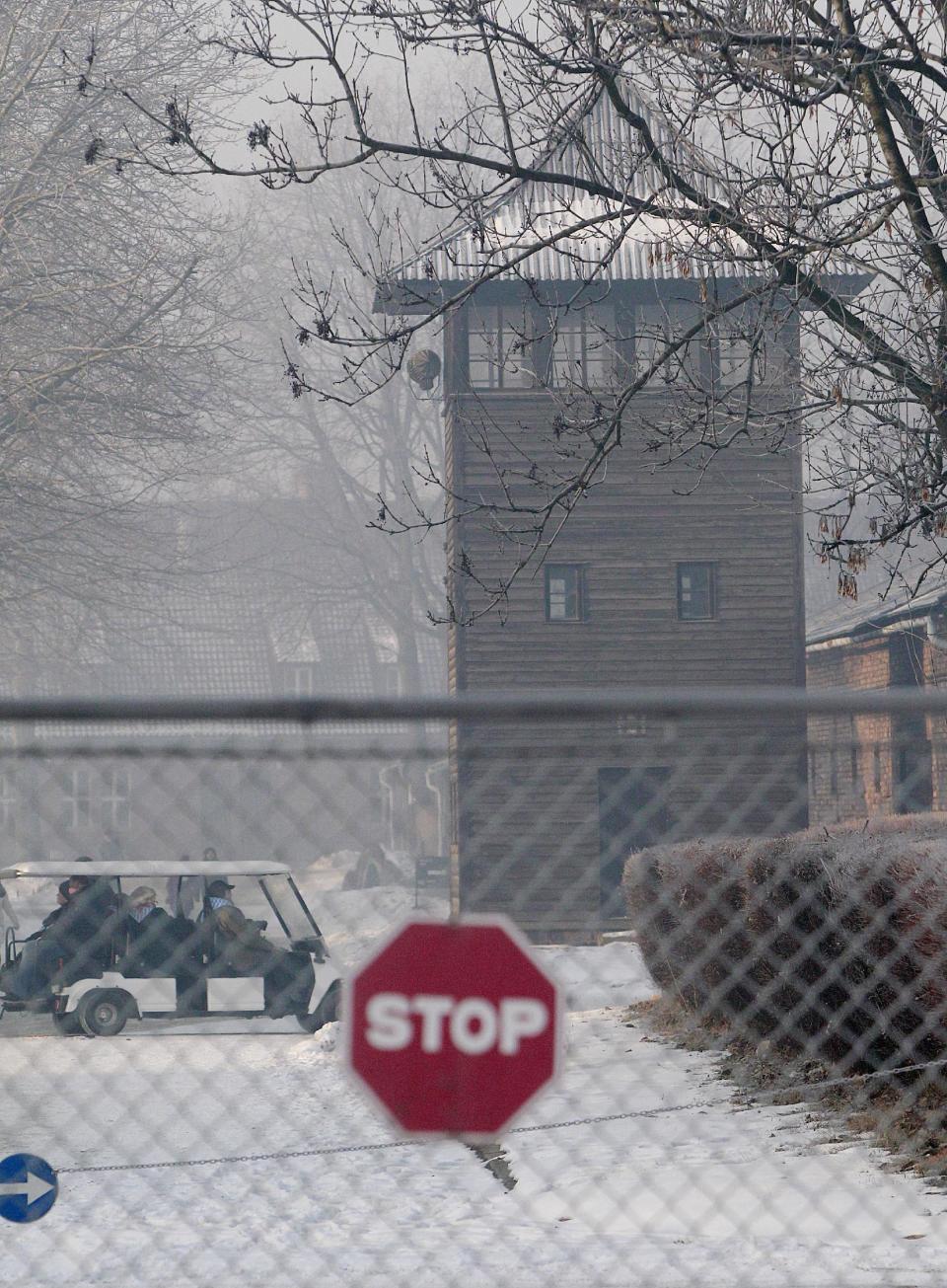 This photo taken on Friday, Jan. 27, 2017 in Oswiecim, Poland, shows a guard's tower of the former Nazi German death camp of Auschwitz that the Nazis operated in occupied Poland during World War II. Poland's historians have put online what they say is the most complete list of Nazi SS commanders and guards at Auschwitz, in hopes some of them can still be brought to justice. (AP Photo/Czarek Sokolowski)