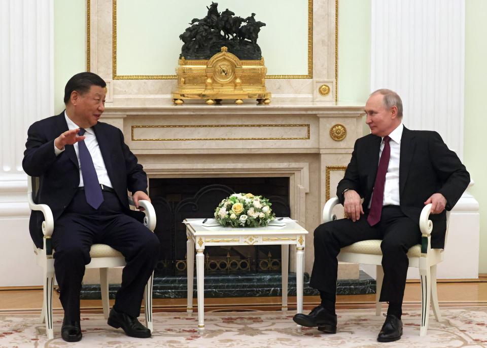 Chinese President Xi Jinping gestures as he speaks to Russian President Vladimir Putin during their meeting at the Kremlin in Moscow, Russia, Monday, March 20, 2023. (Sergei Karpukhin, Sputnik, Kremlin Pool Photo via AP)