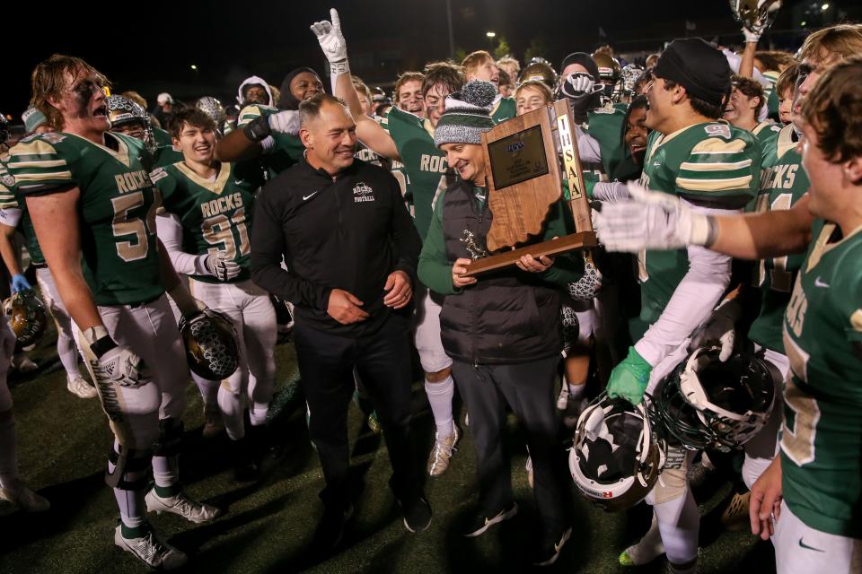 Westfield's Coach Jake Gilbert received the regional championship trophy as Hamiliton Southeastern loses to Westfield High School in the IHSAA Class 6A Regional Championship, Nov 10, 2023; Westfield, IN, USA; at Westfield High School.