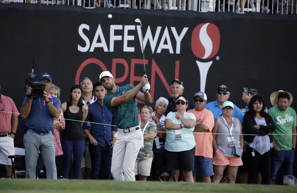 Kevin Tway chips the ball onto the green of the second playoff hole of the Safeway Open PGA golf tournament Sunday, Oct. 7, 2018, in Napa, Calif. Tway won the tournament on the third playoff hole. (AP Photo/Eric Risberg)