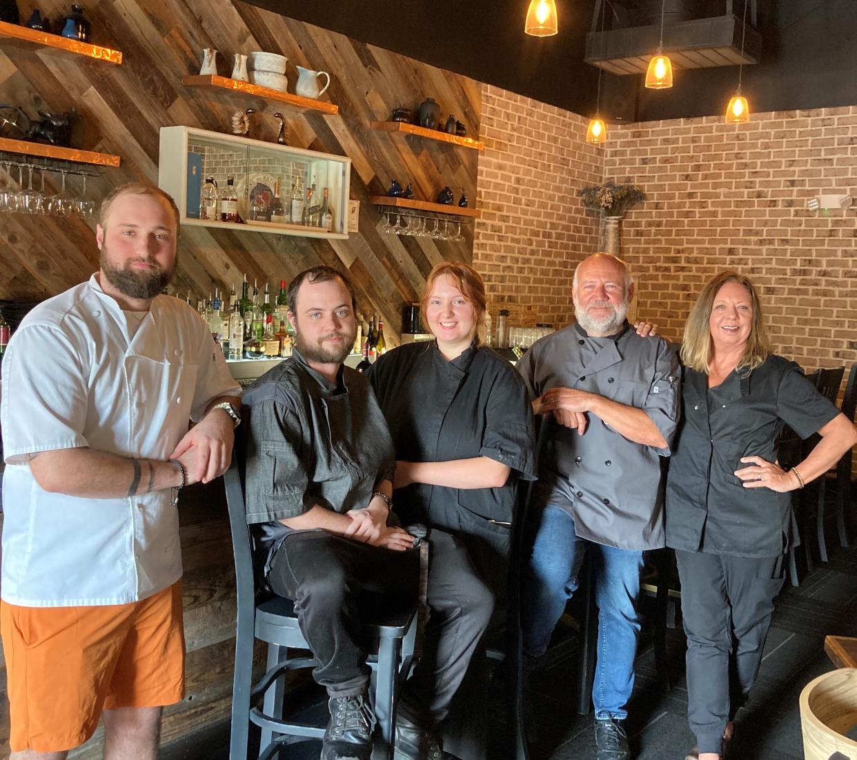 From left, Bart Williams, Austin Fain, Rhiannon McAllister, Shawn Underwood and Amy Siler at Epicurean Bistro, 1978 Eastwood Road in Wilmington, N.C. on June 28, 2023. ALLISON BALLARD/STARNEWS