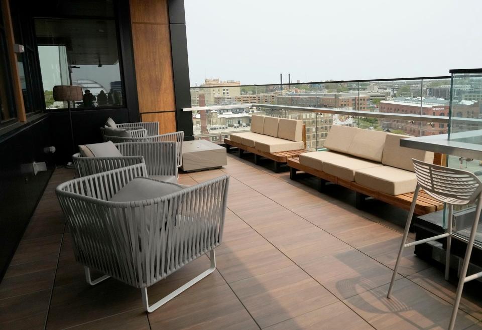 The patio area of Il Cervo, which is Italian for "the deer," offers views of the city from the 9th floor of the new Trade Hotel, pictured on May 18, 2023. The hotel has 207 rooms, a rooftop restaurant and a lounge with city views.