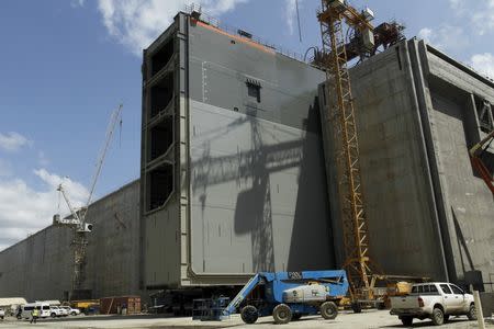 A steel rolling gate, part of the third set of locks on the Pacific side, is installed as part of the Panama Canal Expansion Project in Panama City March 24, 2015. REUTERS/Carlos Jasso
