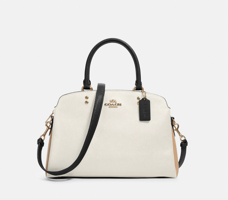 Lillie Carryall in chalk colourblock (Photo via Coach Outlet)