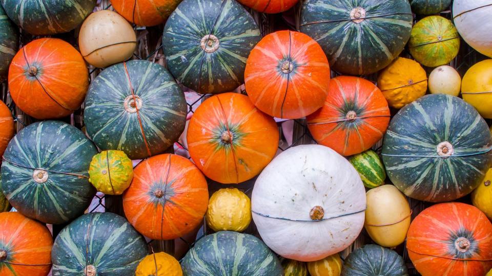 Full Frame Shot Of Pumpkins At Market For Sale