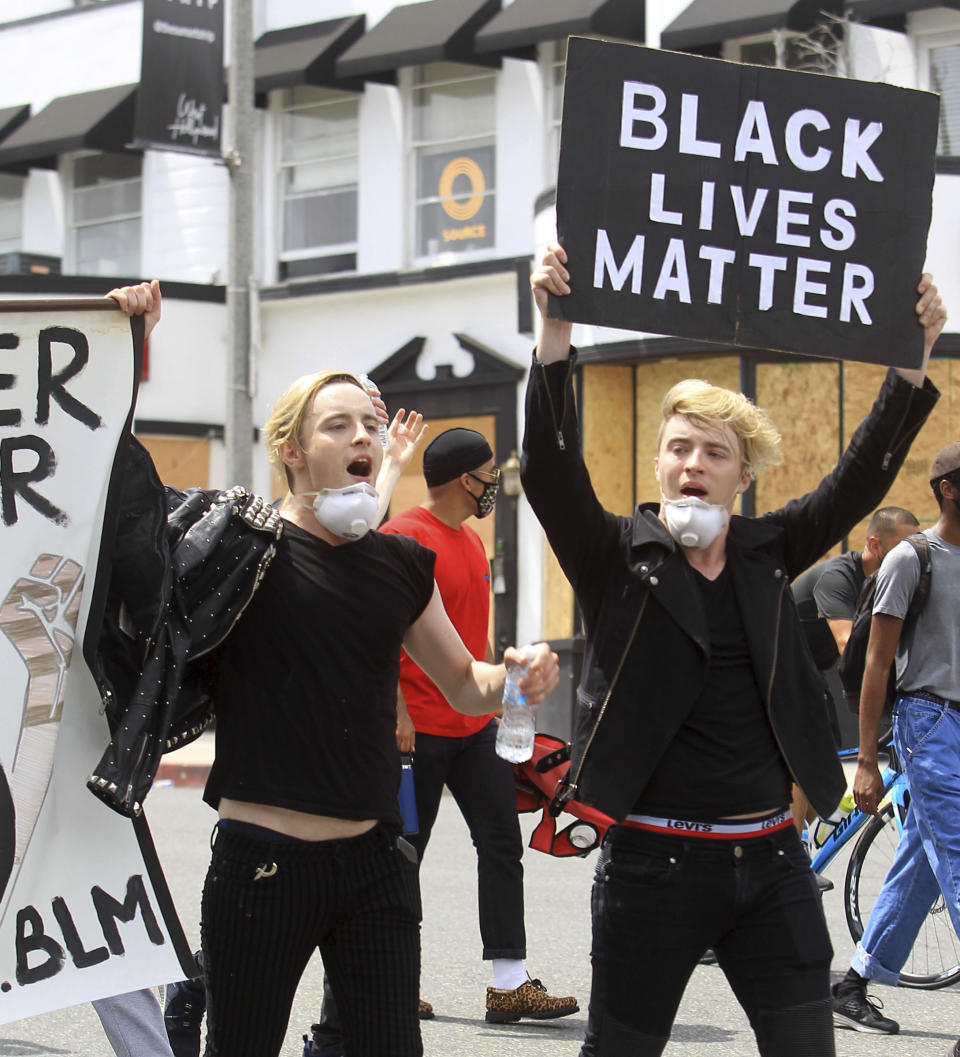 Photo by: zz/GOTPAP/STAR MAX/IPx 2020 6/2/20 Identical twins John Grimes and Edward Grimes - aka Jedward - join demonstrators on June 2, 2020 in Los Angeles, California in protest over the death of George Floyd who died while being arrested by police officers in Minneapolis, Minnesota on May 25th.