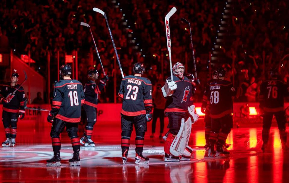 The Carolina Hurricanes goalie Frederik Andersen (31) and his teammates acknowledge the crowd following their introduction on Wednesday, October 11, 2023 at PNC Arena, in Raleigh N.C.