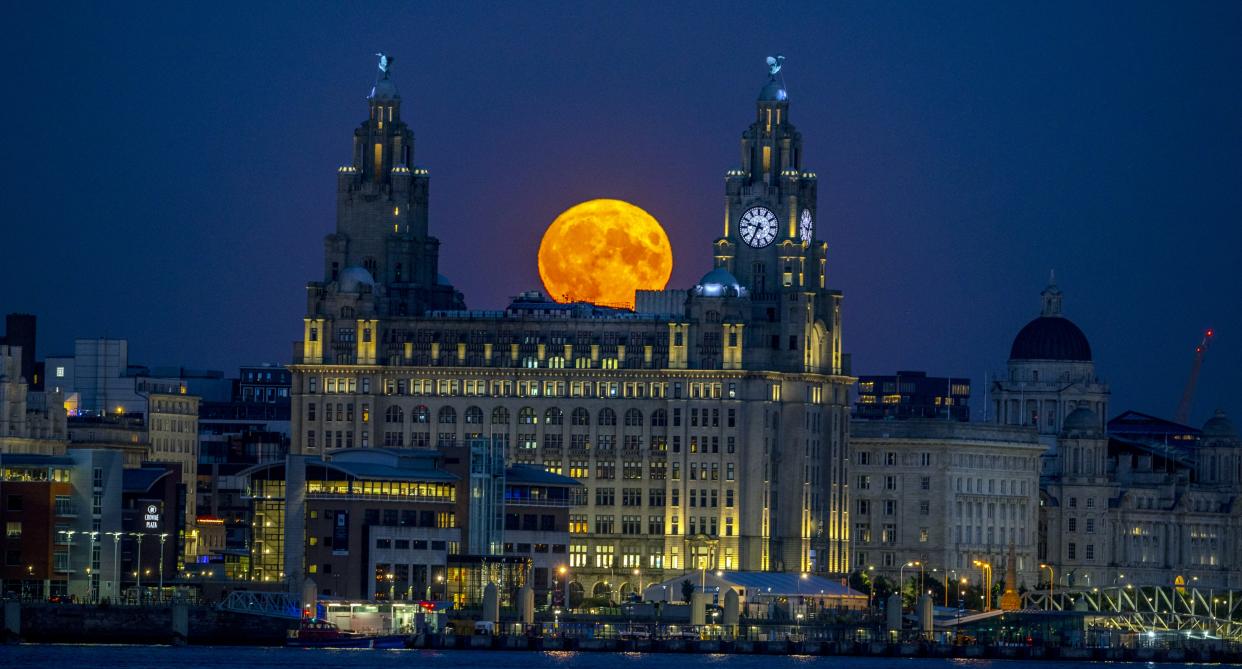 A supermoon rises above Liverpool. (Getty Images)