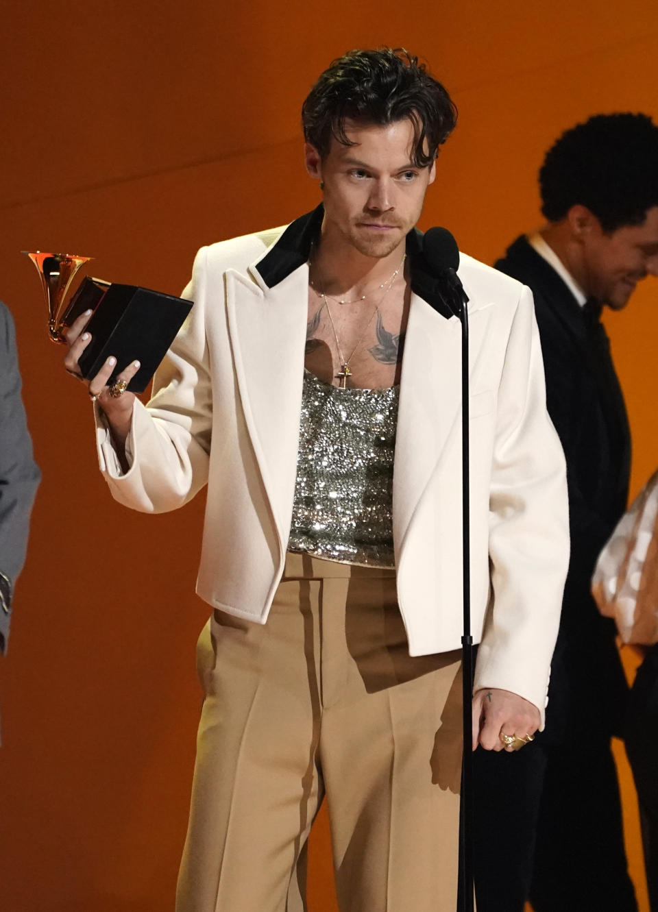 Harry Styles accepts the award for album of the year for "Harry's House" at the 65th annual Grammy Awards on Sunday, Feb. 5, 2023, in Los Angeles. (AP Photo/Chris Pizzello)