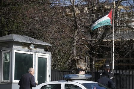 Policemen stand outside the compound of the Palestinian embassy in Sofia, Bulgaria February 26, 2016. REUTERS/Stoyan Nenov