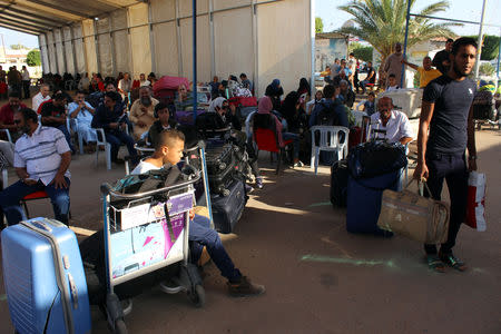Passengers wait for a flight at Misrata airport in Misrata, Libya, September 20, 2018. REUTERS/Ayman al-Sahili