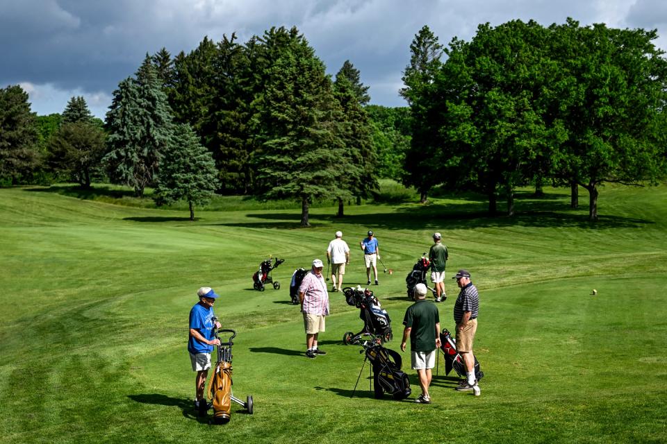 A group of golfers begin play at Groesbeck Golf Course on Wednesday, May 22, 2024, in Lansing