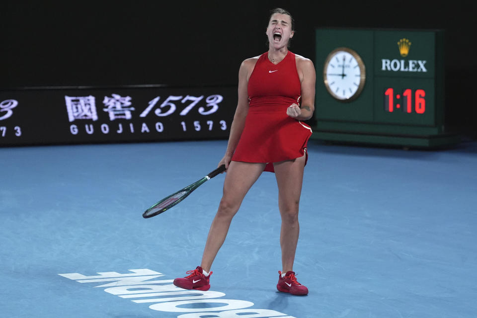 Aryna Sabalenka of Belarus reacts during her match against Zheng Qinwen of China in the women's singles final at the Australian Open tennis championships at Melbourne Park, Melbourne, Australia, Saturday, Jan. 27, 2024. (AP Photo/Andy Wong)