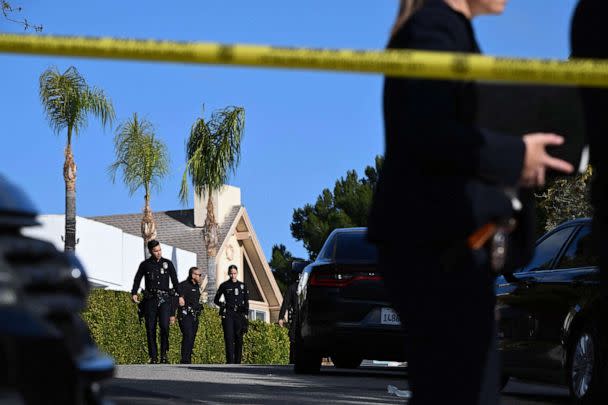 PHOTO: Law enforcement work an investigation of an early morning shooting that left three people dead and four wounded, Jan. 28, 2023, in the Beverly Crest neighborhood of Los Angeles, just north of Beverly Hills. (Robyn Beck/AFP/AFP via Getty Images)