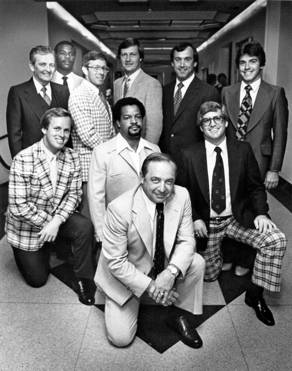 Nick Saban (back right) was a secondary coach at Ohio State under coach Earl Bruce (front middle).