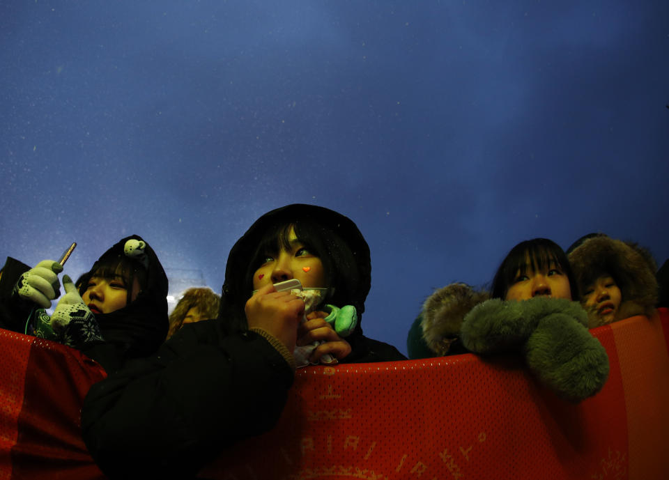 <p>Spectators wait for the start of the medals ceremony at the 2018 Winter Olympics in PyeongChang, South Korea, Feb. 23, 2018.<br>(AP Photo/Charlie Riedel) </p>