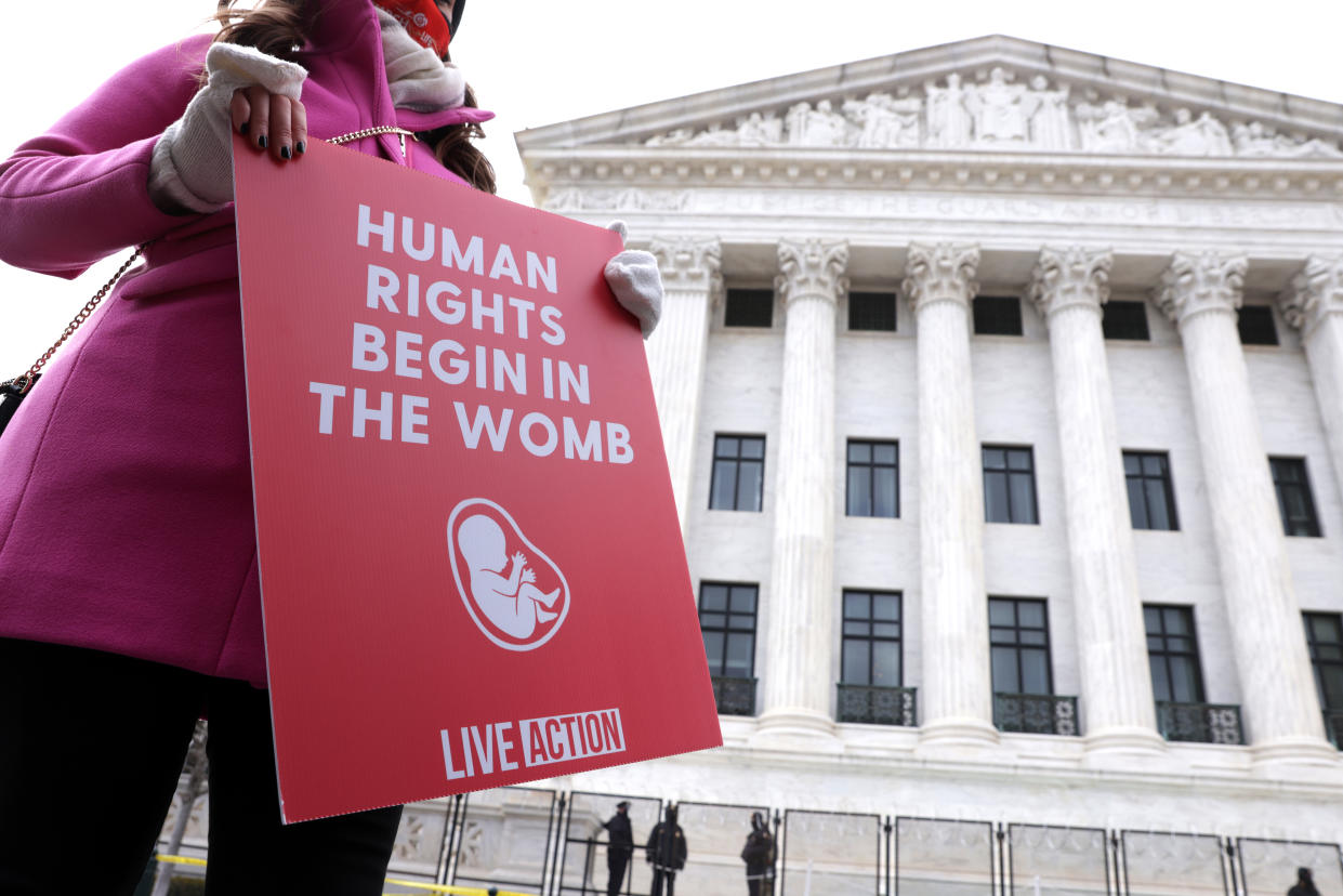 An anti-abortion activist holds a sign outside the U.S. Supreme Court during the 48th annual March for Life January 29, 2021 in Washington, DC. (Alex Wong/Getty Images)
